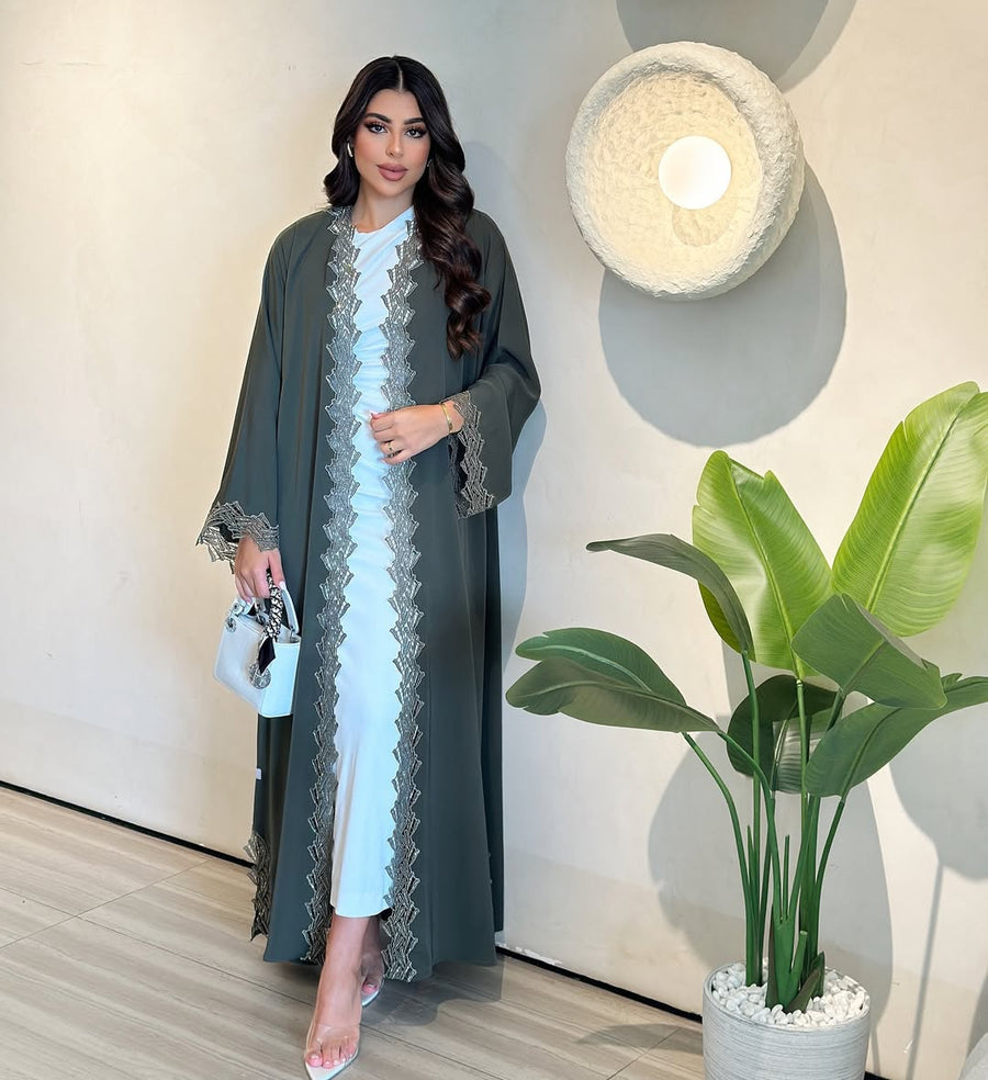 ‎ ‎The green abaya